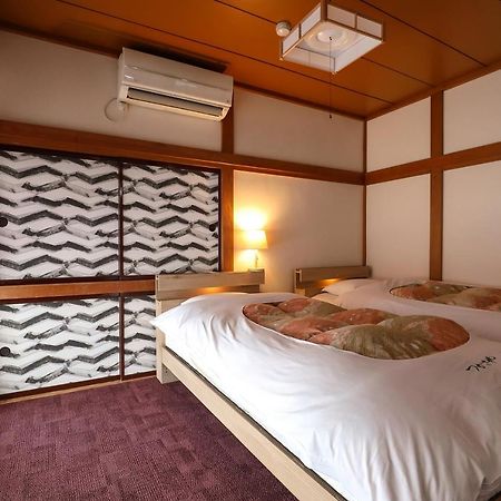 Tsukasaya Ryokan Tsuruoka Buitenkant foto