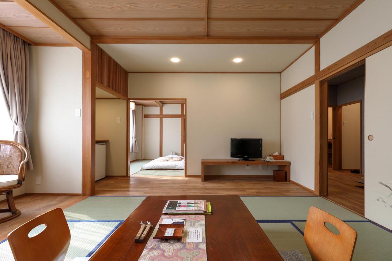 Tsukasaya Ryokan Tsuruoka Buitenkant foto