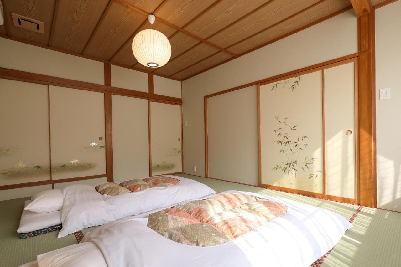 Tsukasaya Ryokan Tsuruoka Buitenkant foto