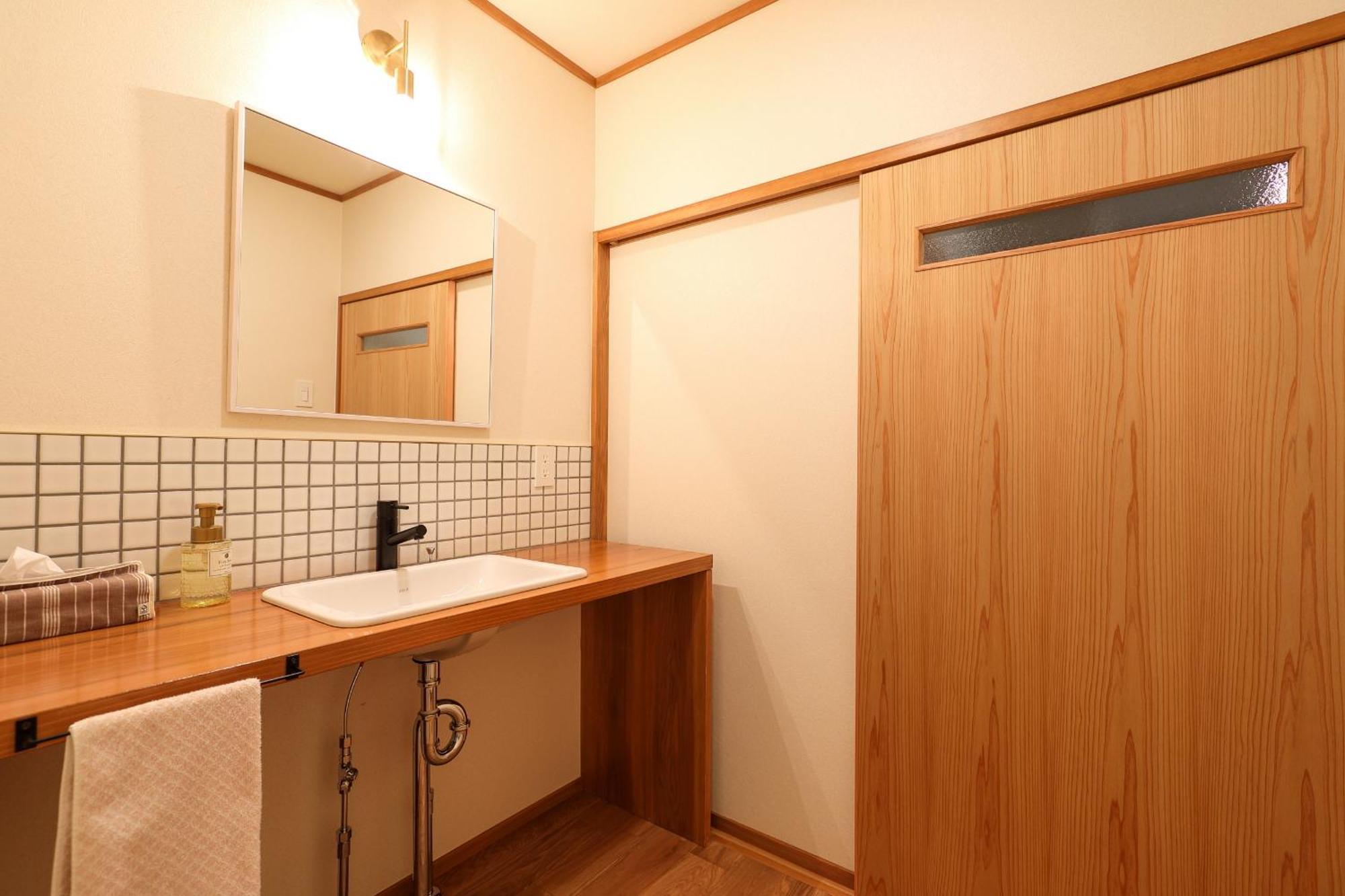 Tsukasaya Ryokan Tsuruoka Buitenkant foto
